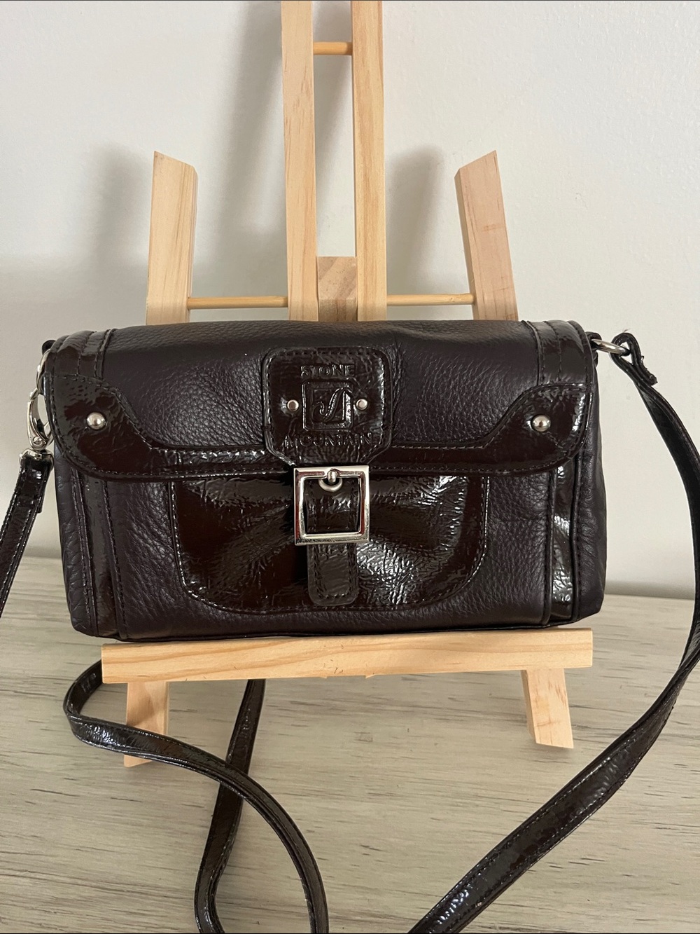 Stone Mountain Accessories Dark Brown Patent Leather Crossbody Bag with Buckle